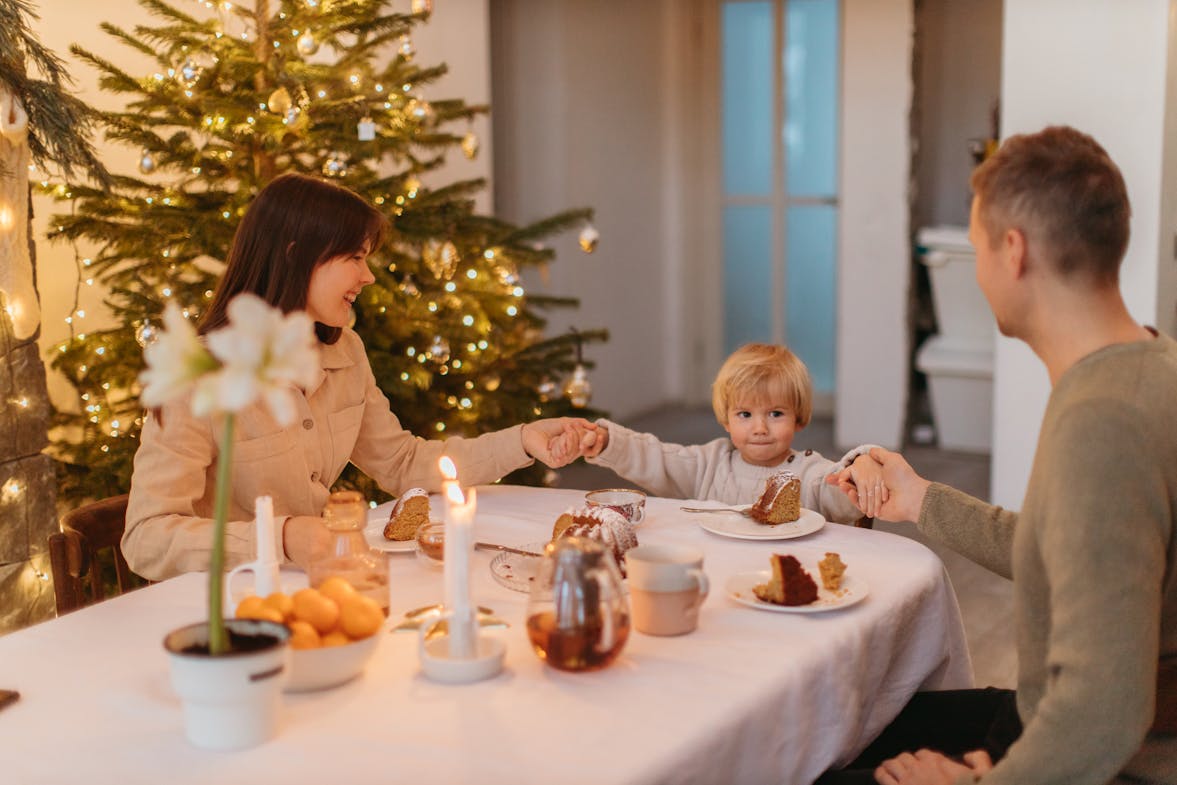 Photo by Anastasia Shuraeva: https://www.pexels.com/photo/2-children-sitting-on-chair-in-front-of-table-with-candles-and-candles-6305957/